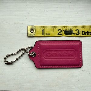Coach Fuchsia Leather hang tag Accessory